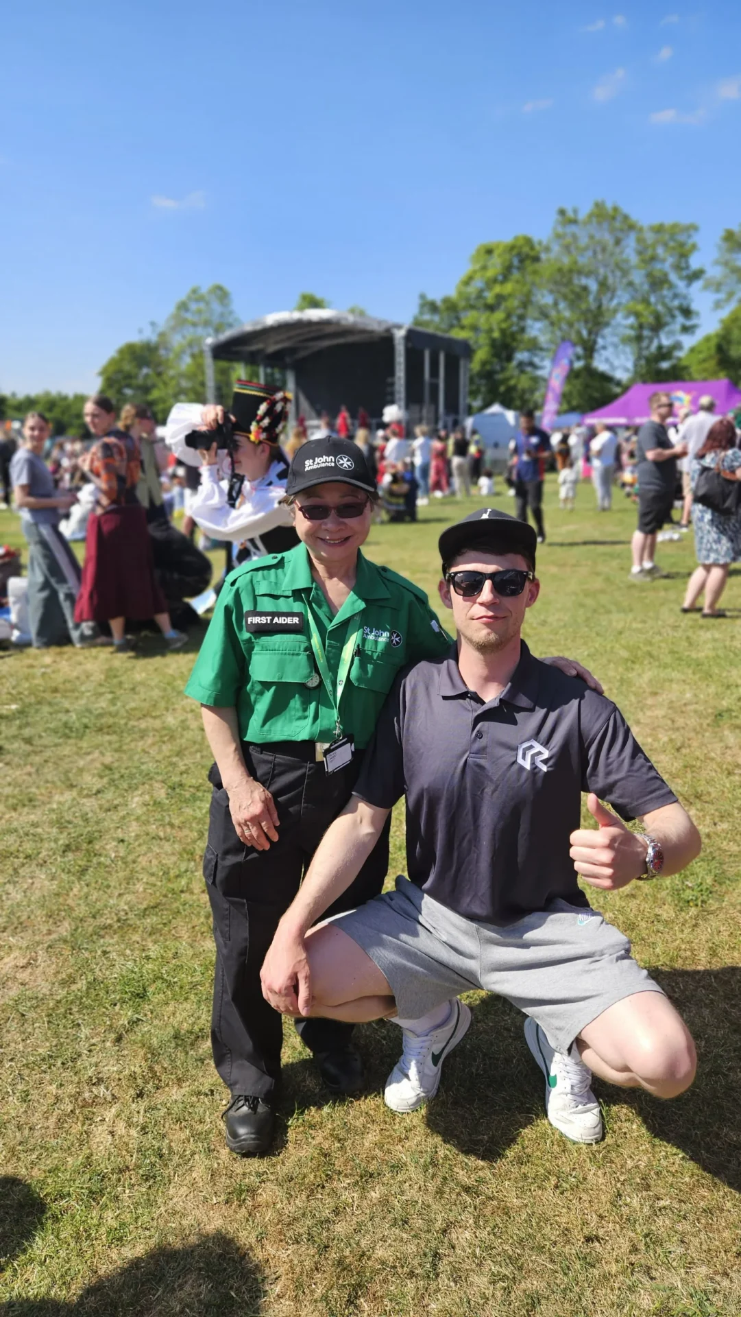 St John Ambulance first aider and Lukas, RAD Removals’ mover, at Polish Heritage Day 2025 in Hounslow, promoting movers West London and storage units Ealing.